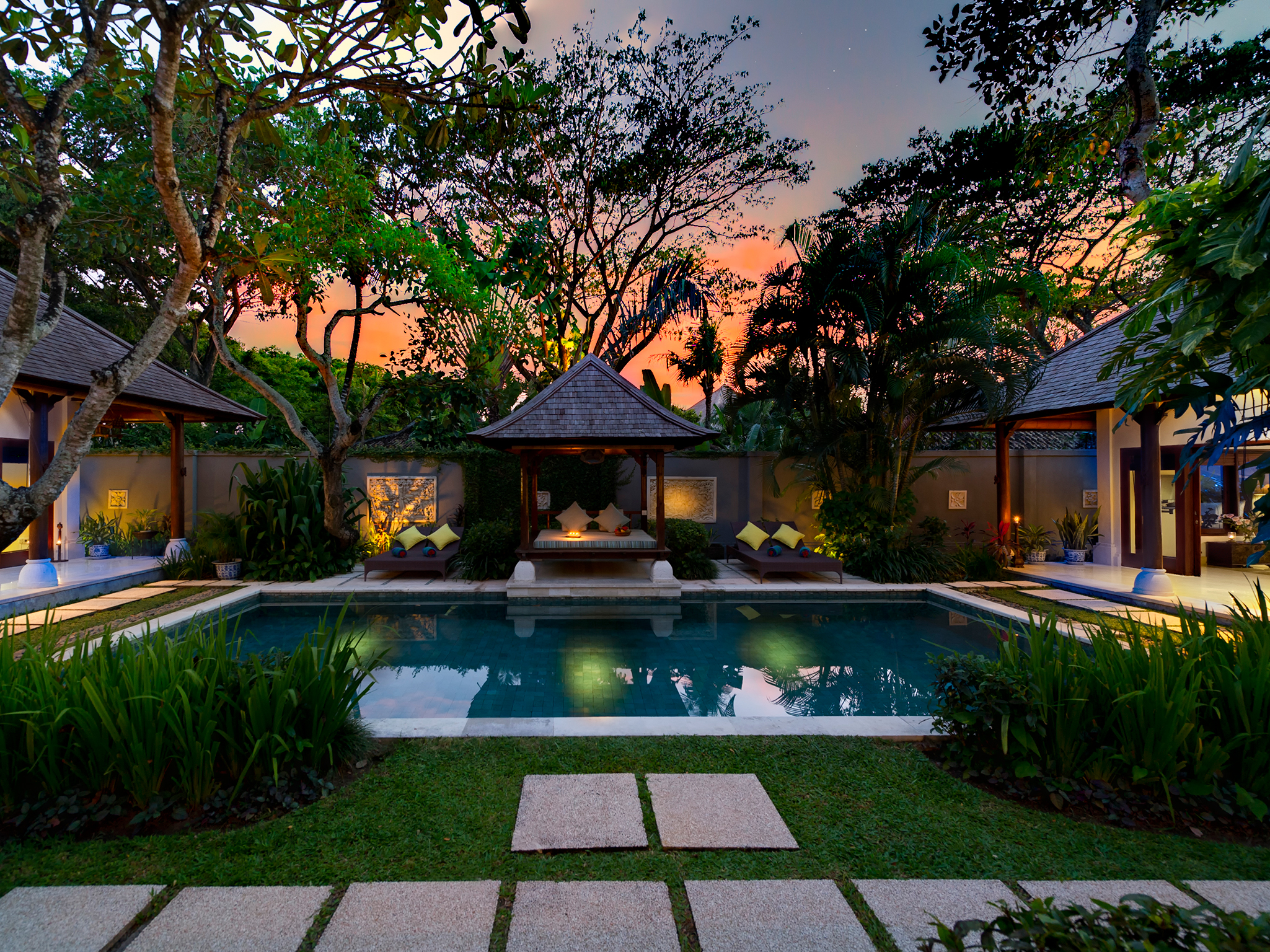 14. Villa Kedidi - Pool and gardens at dusk - Villa Kedidi, Canggu, Bali
